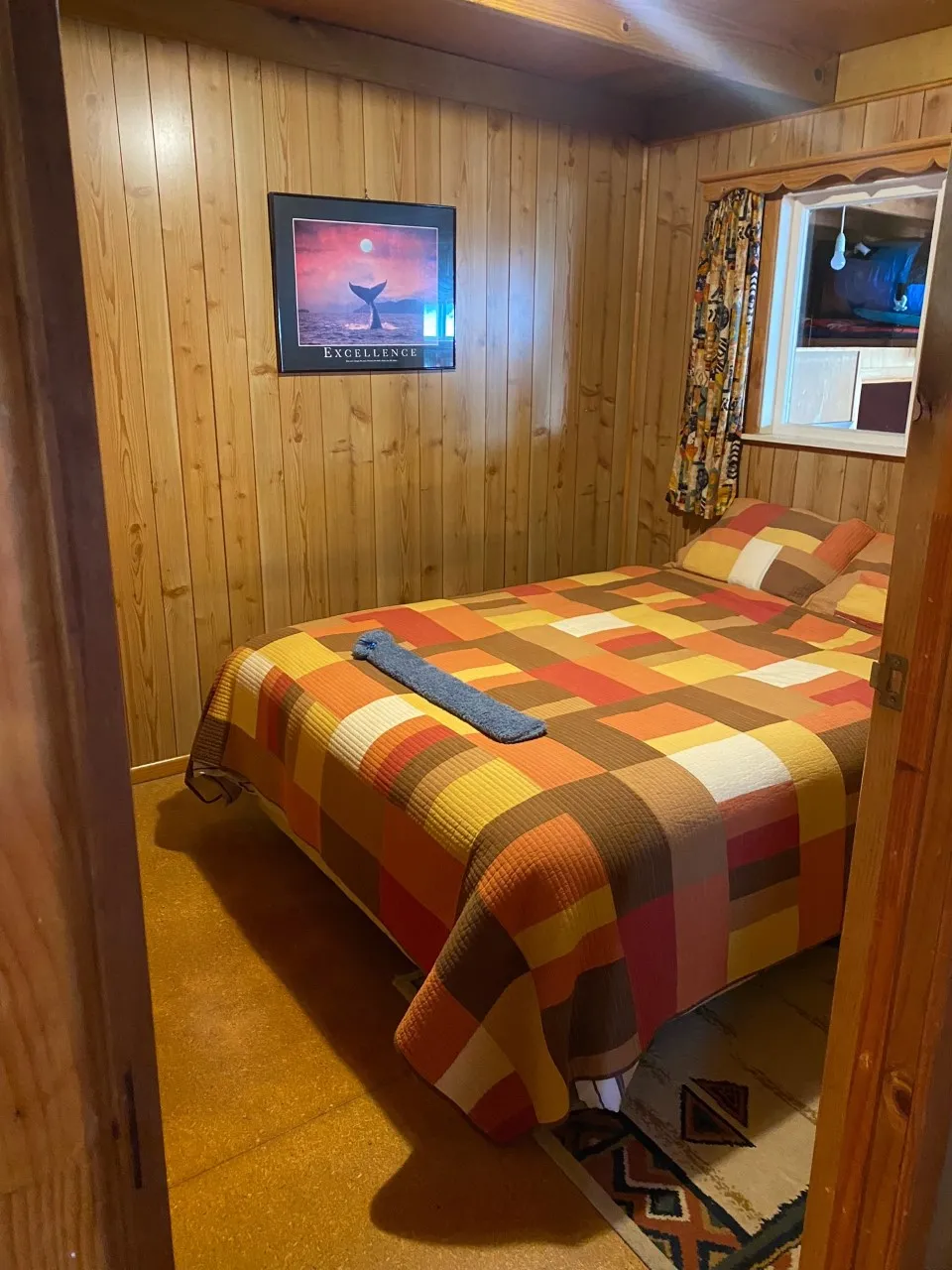 Queen bed in Bach A’s main bedroom