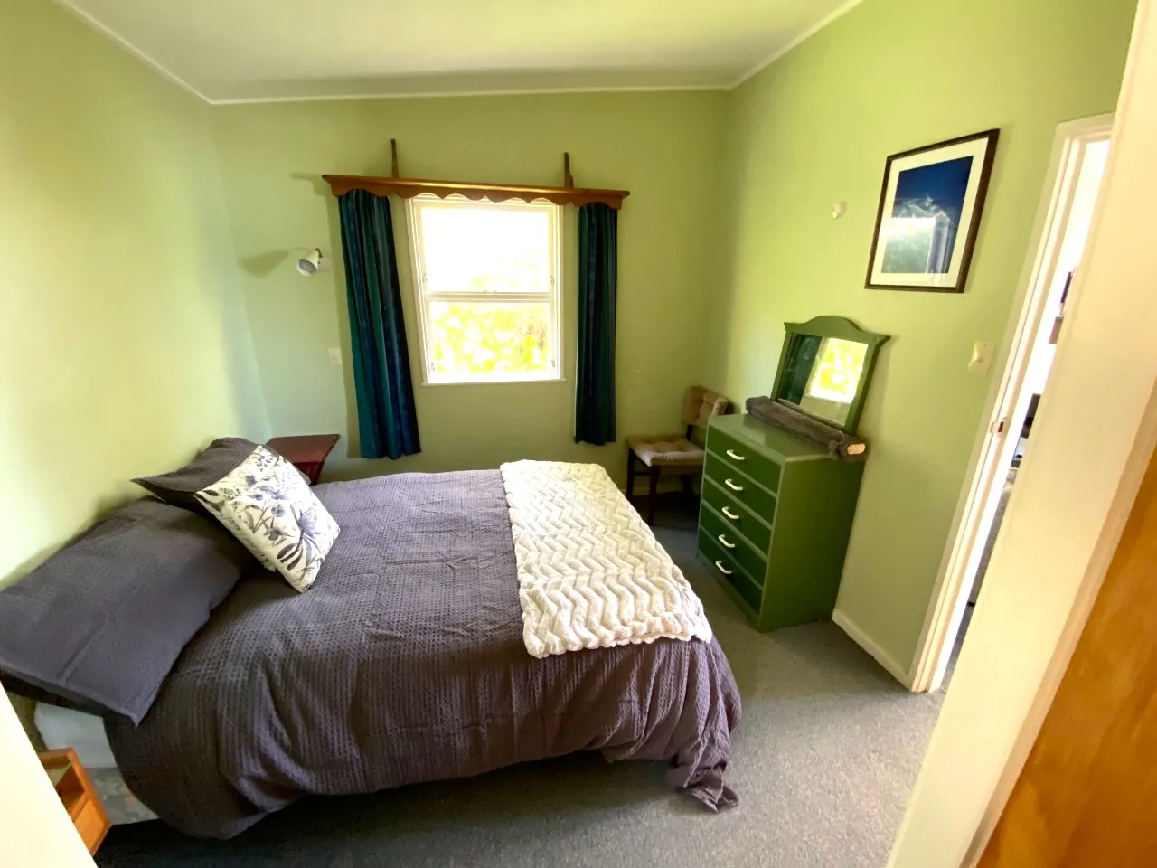 Bach B’s separate bedroom with bed and window