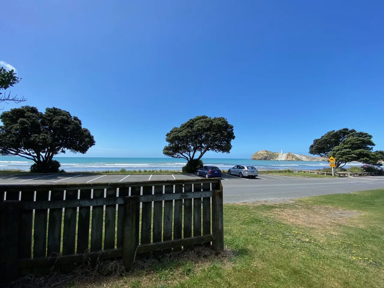 View across the front yard and road to Castlepoint beach
